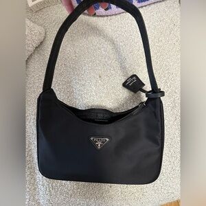 Black little bag new with tag dust bag , packaging and everything ,not designer